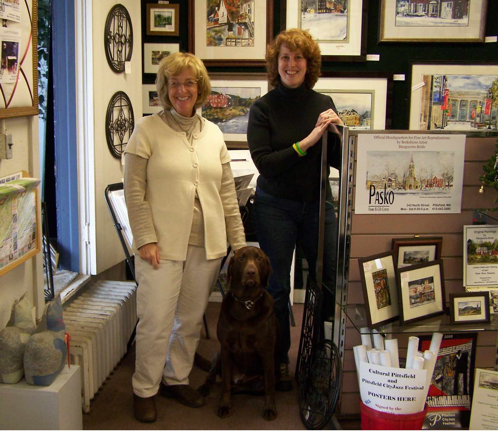 Marguerite Bride and Judy Gallup in front of new display at Pasko's Frame and Gift Center, 243 North Street, Pittsfield